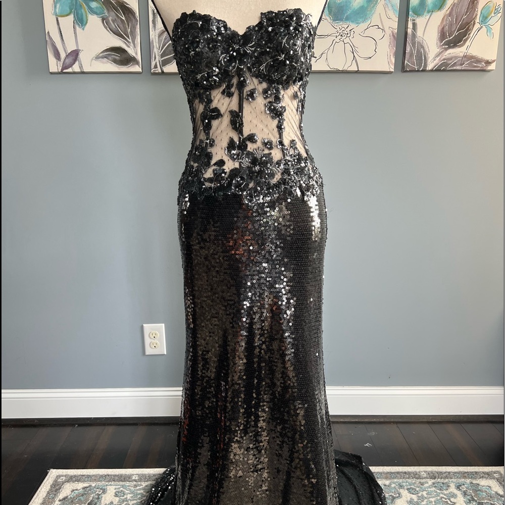 Night Moves Sequin black dress. Built in bra. See through panels